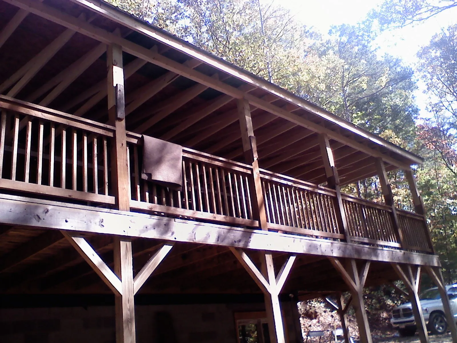 Timber framing under a new elevated porch and deck — Roof Leak Repair in Sand Springs by Roofing Brothers